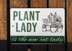 a sign that says plant lady is the new cat lady