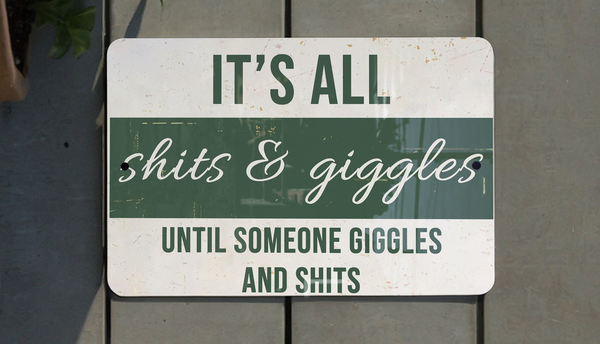 a green and white sign that says it's all shits & giggles