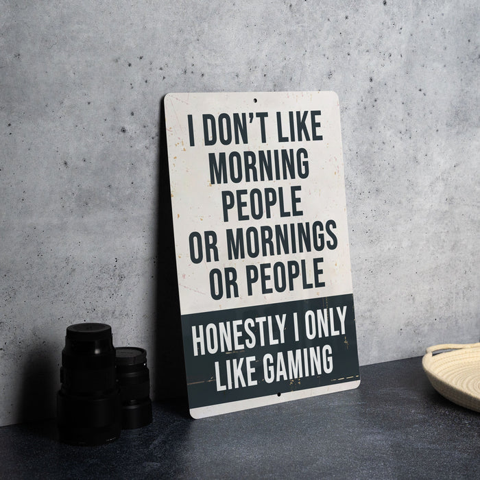 a sign sitting on top of a table next to a cup