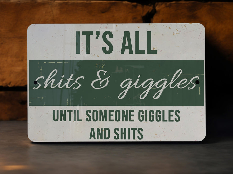 a sign that says it's all shits & giggles until someone giggles and