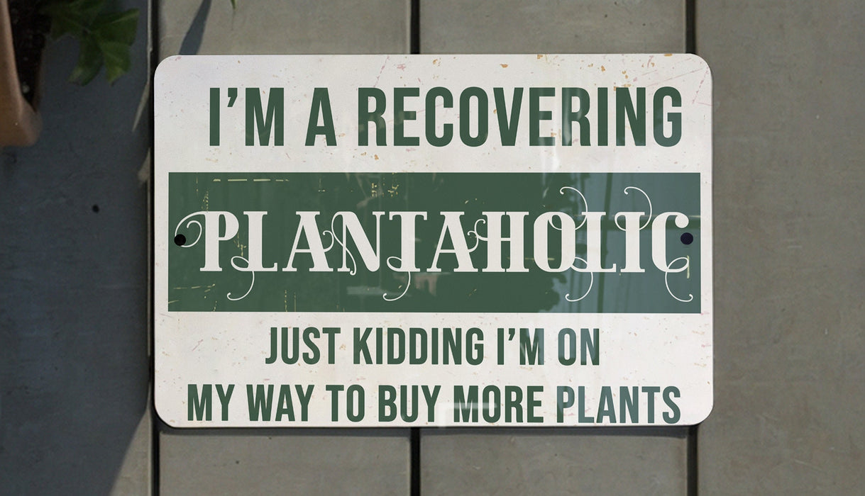 a sign that says i'm a recovering plantaholic