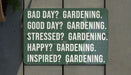 a green sign that says, bad day gardening good day gardening stressed? gardening