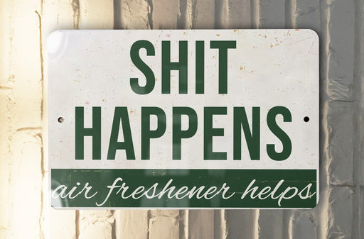 a sign that says shit happens air freshener helps
