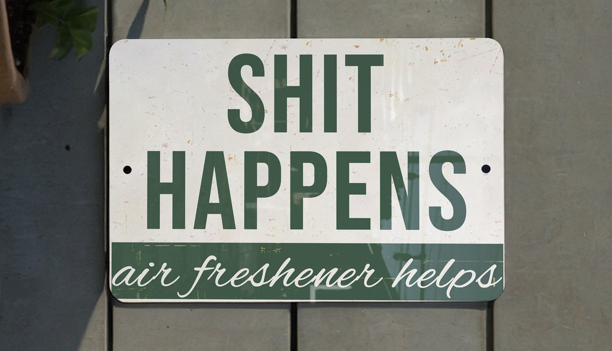 a sign that says shit happens air freshener helps