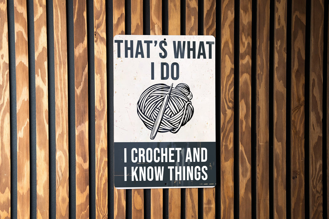 a sign on a wooden wall that says that's what i do i cr