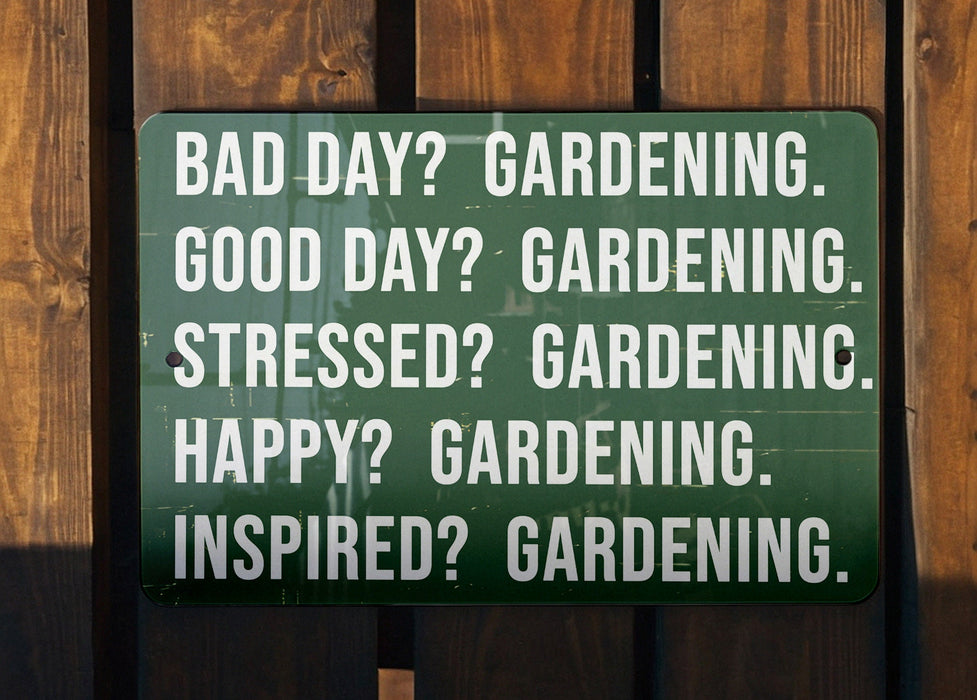 a green sign on a wooden fence that says, bad day? gardening good day