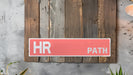 a sign on a wall that says hr path