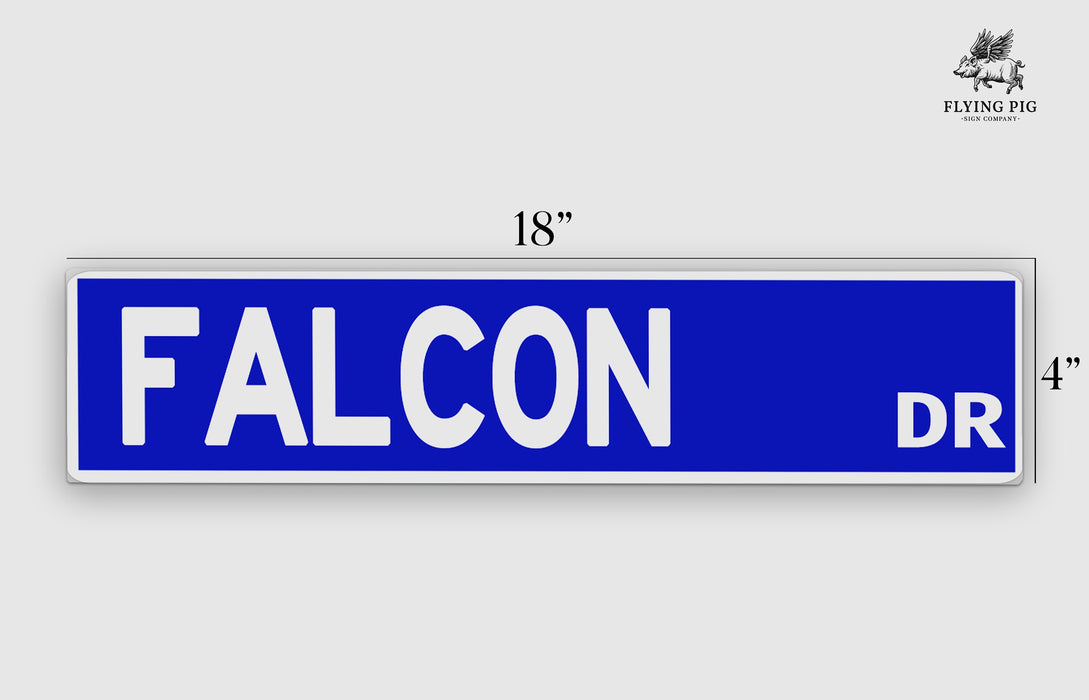 a blue and white street sign that says falcon