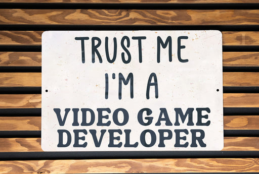 a sign that says trust me i'm a video game developmenter
