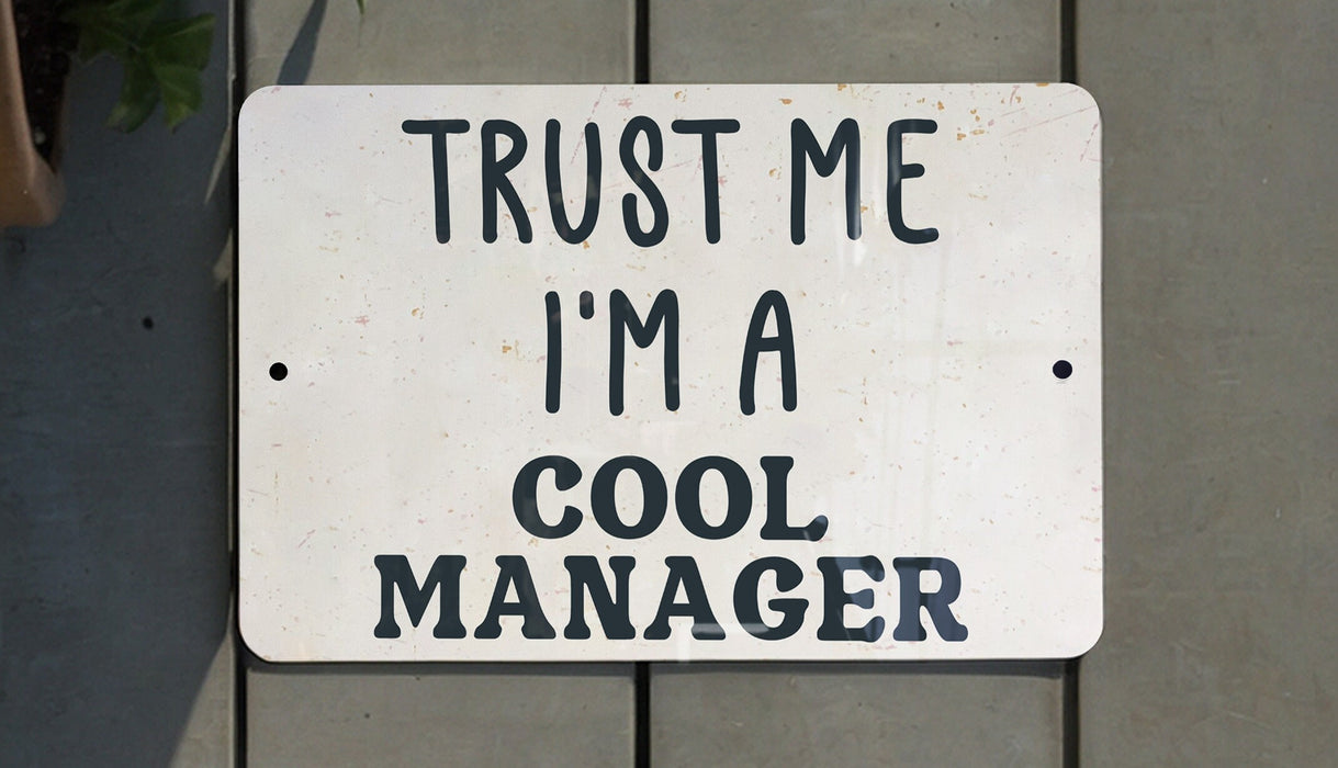 a sign that says trust me i'm a cool manager