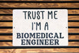 a sign that says trust me i'm a biomedical engineer