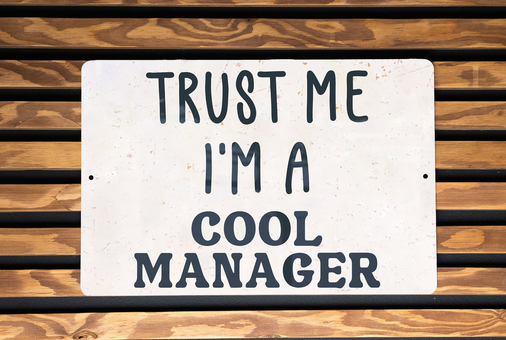 a sign that says trust me i'm a cool manager