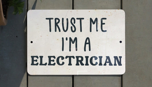 a sign that says trust me i'm a electrician