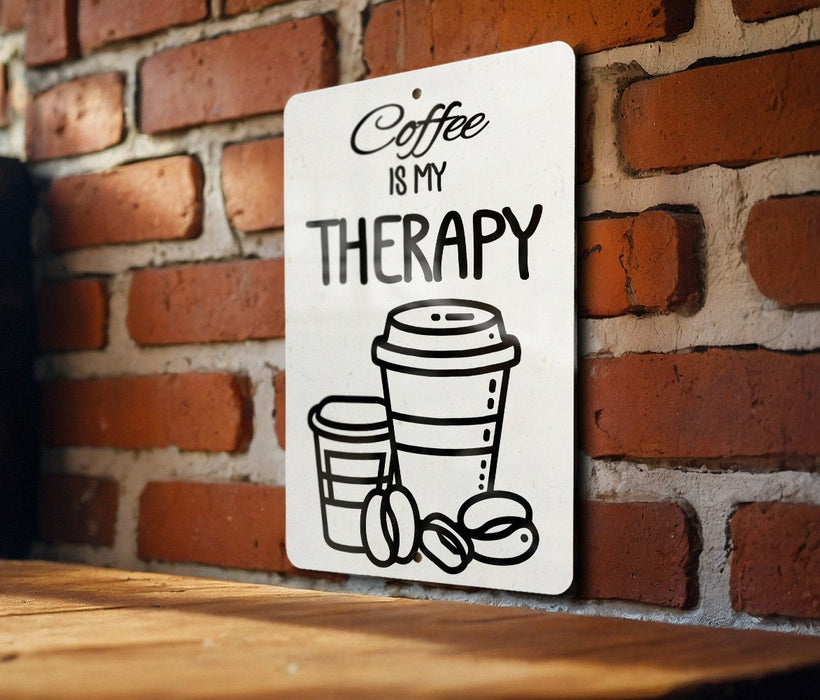 a sign on a brick wall that says coffee is my therapy
