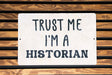 a sign that says trust me i'm a historian