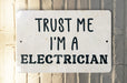a sign that says trust me i'm a electrician