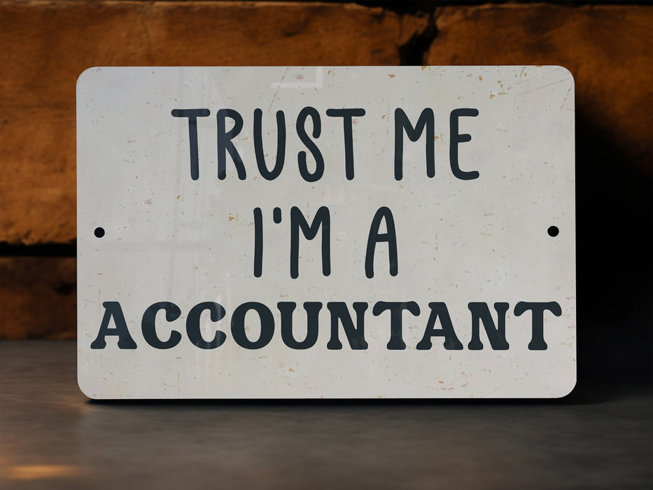 a white sign that says trust me i'm a accountant