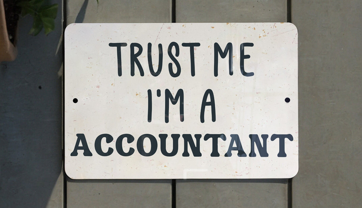 a white sign that says trust me i'm a accountant