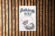 a sign on a wooden wall that says fishing nerd