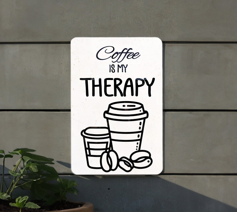 a sign that says coffee is my therapy