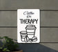 a sign that says coffee is my therapy