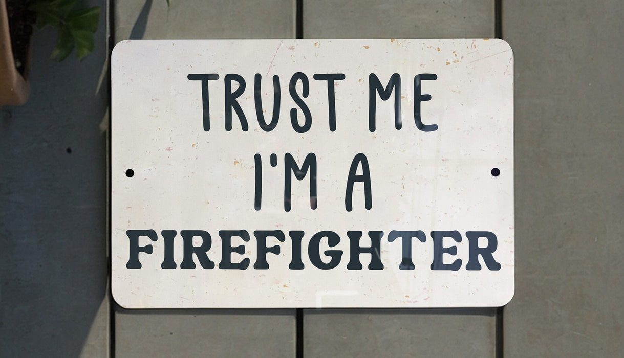 a white sign that says trust me i'm a firefighter