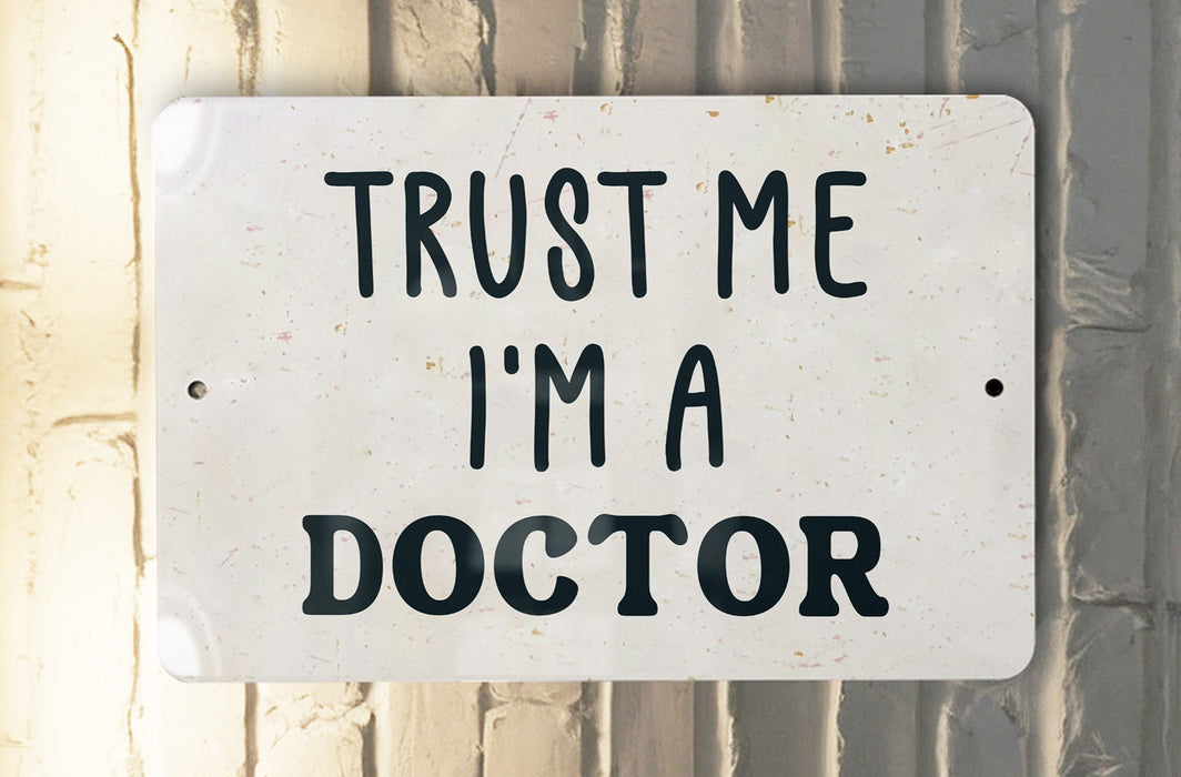 a white sign that says trust me i'm a doctor