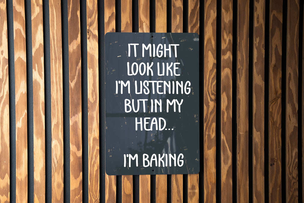 a sign that says it might look like i'm listening but in my head