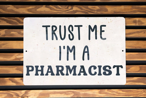 a sign that says trust me i'm a pharmacist