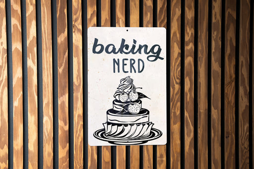 a sign on a wooden wall that says baking nerd