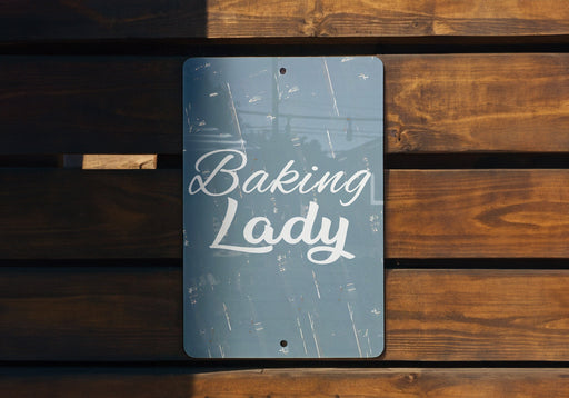 a sign that says baking lady on it