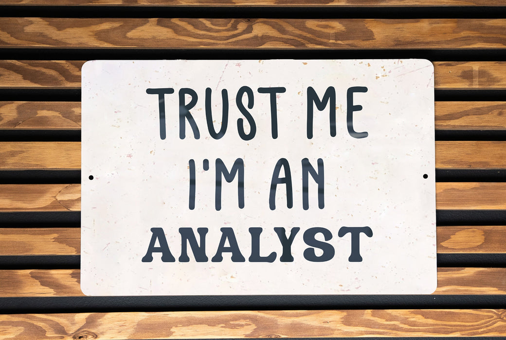 a sign that says trust me i'm an analyst
