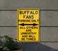 a yellow sign that is on the side of a building