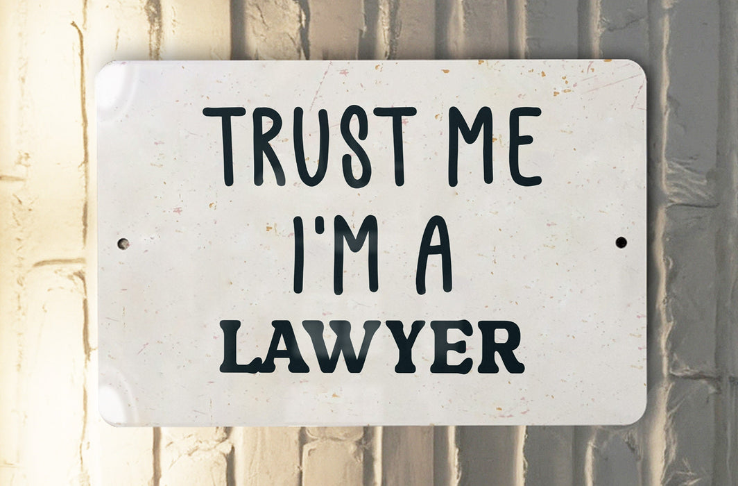 a white sign that says trust me i'm a lawyer