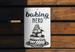 a sign that says baking nerd on it
