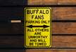 a yellow sign that says buffalo fans parking only all others are unworthyly and