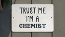 a sign that says trust me i'm a scientist
