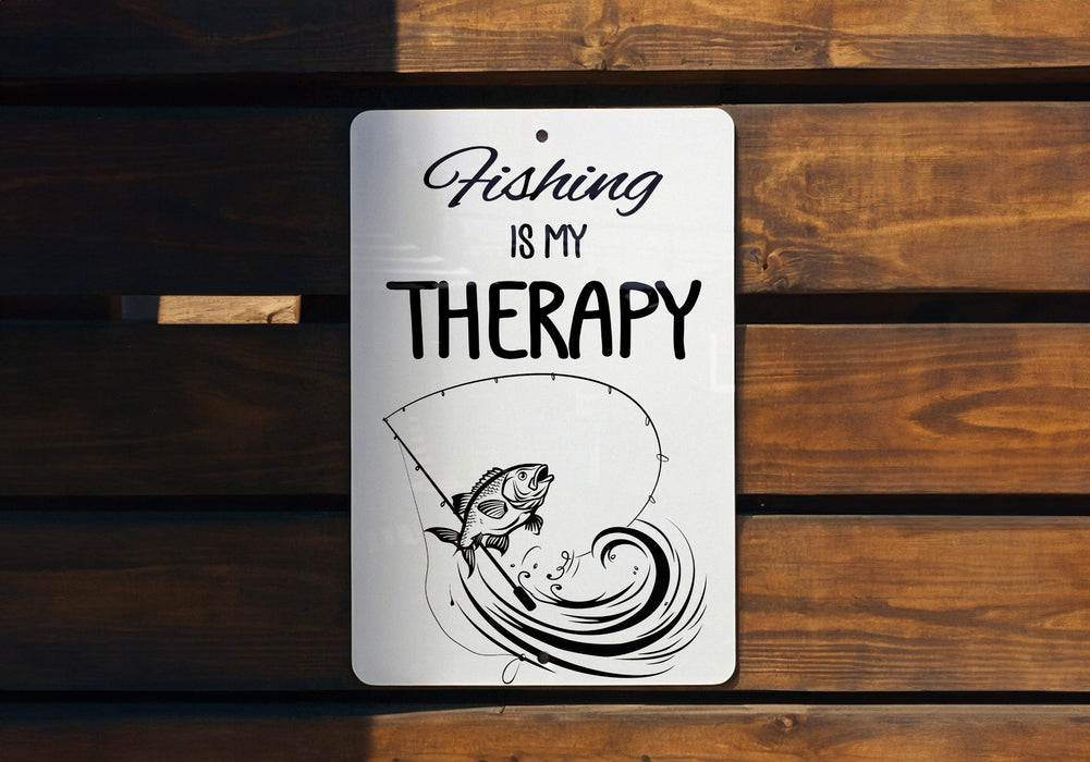 a sign that says fishing is my therapy