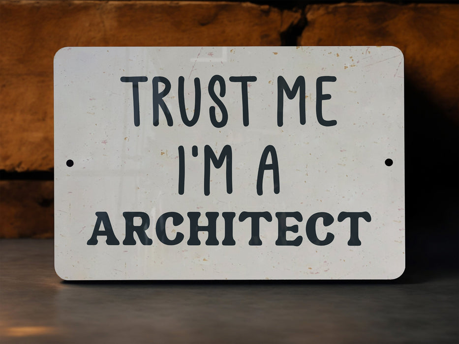 a white sign that says trust me i'm a architecture