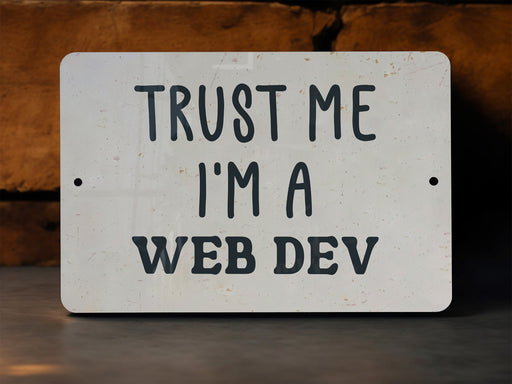 a sign that says trust me i'm a web dev
