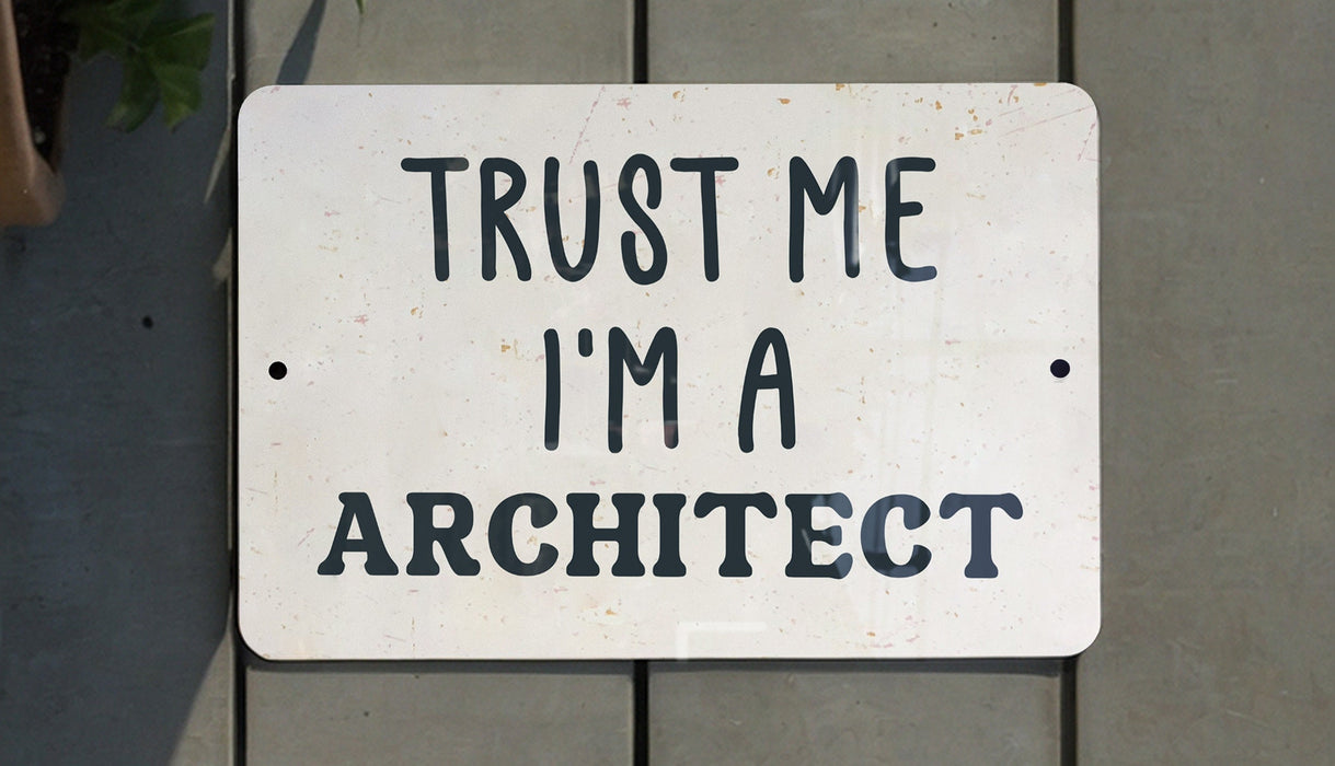 a white sign that says trust me i'm a architecture