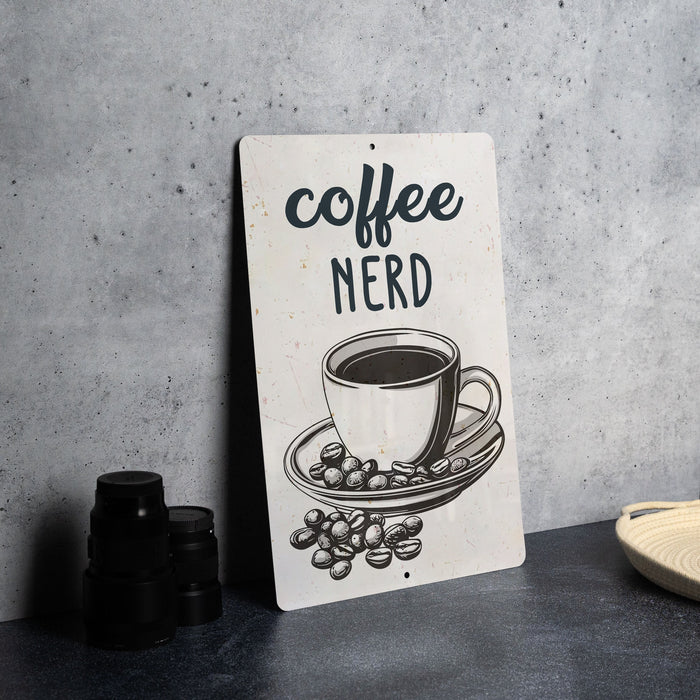 a sign that says coffee nerd with a cup of coffee