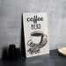a sign that says coffee nerd with a cup of coffee