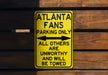 a yellow street sign on a wooden wall