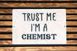 a sign that says trust me i'm a scientist