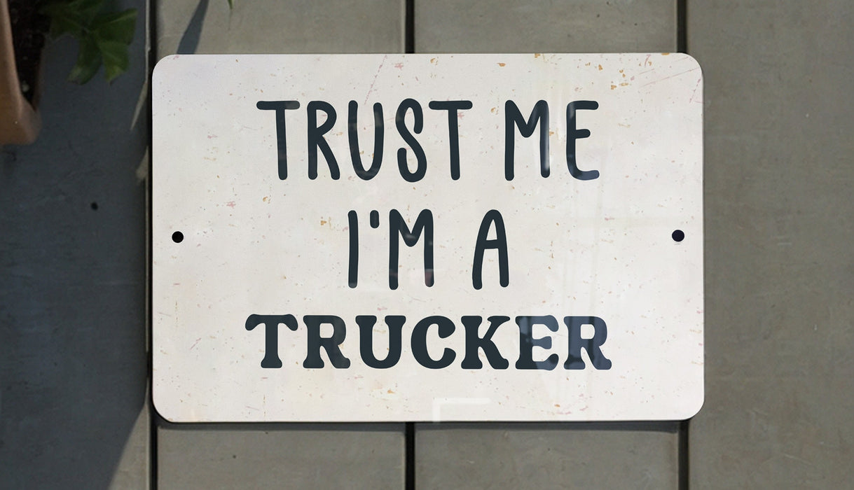 a white sign that says trust me i'm a trucker