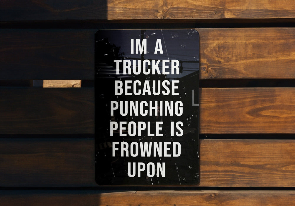 a sign on a wooden bench that says i'm a trucker because punching