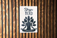 a sign on a wooden wall that says yoga nerd