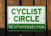 a close up of a sign on a wooden fence