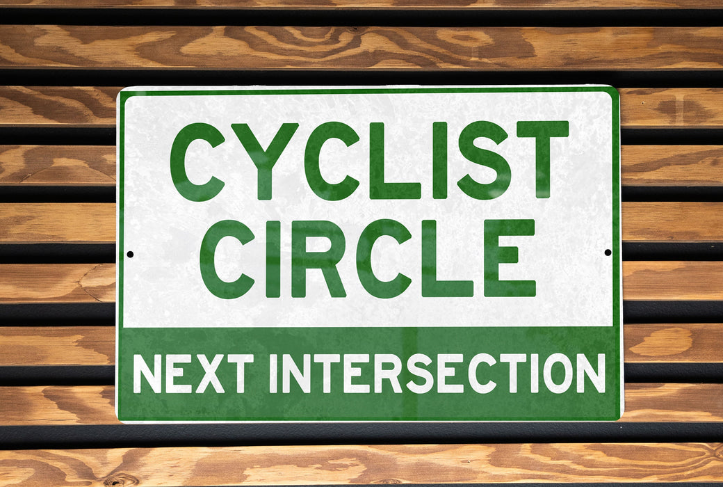 a close up of a sign on a wooden wall